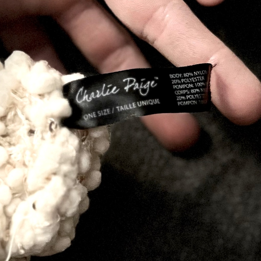 Charlie Paige knit winter beanie hat, other beanie comes with it.